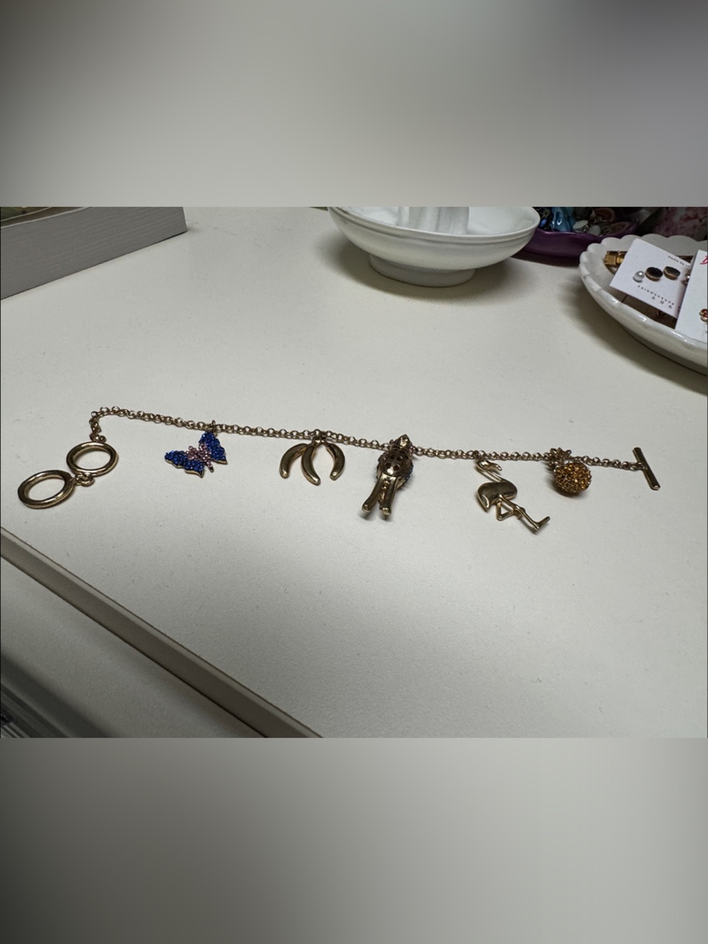 Gold-Tone Charm Bracelet with Blue Crystal Butterfly